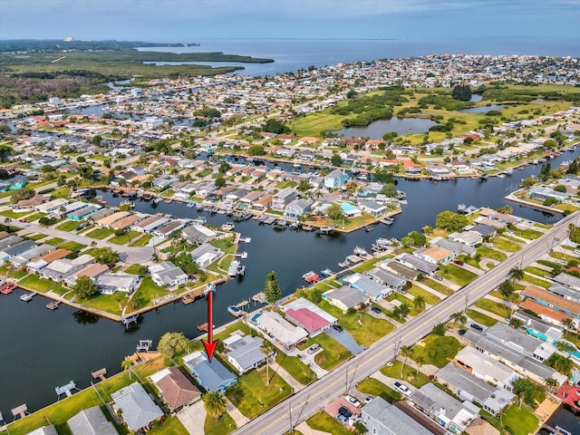 drone / aerial view with a water view