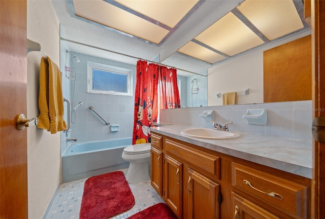 full bathroom featuring vanity, shower / bath combination with curtain, and toilet