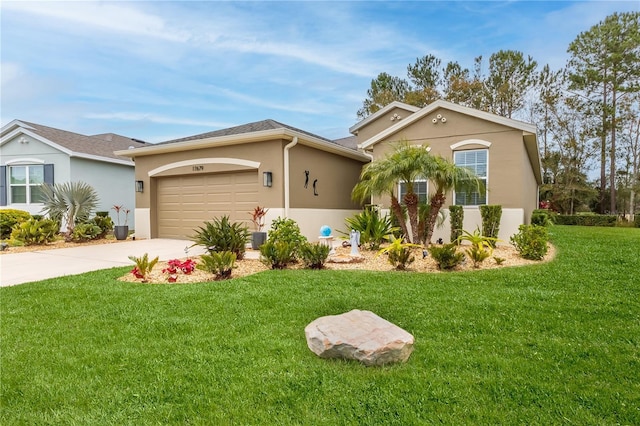 ranch-style house with a garage and a front lawn