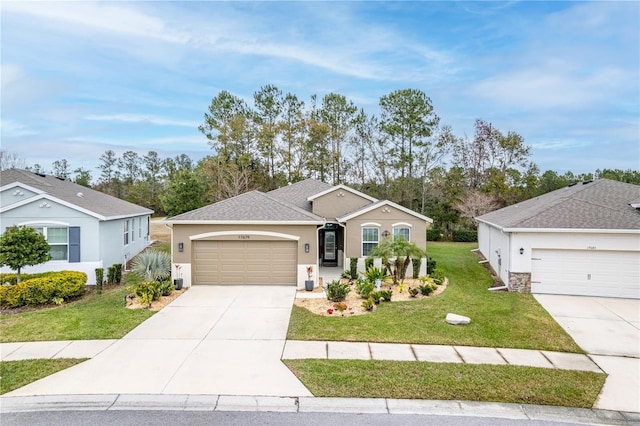 ranch-style house featuring a garage and a front yard