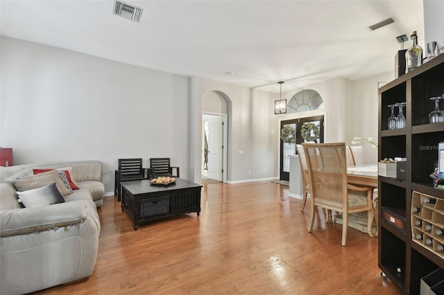 living room with hardwood / wood-style flooring