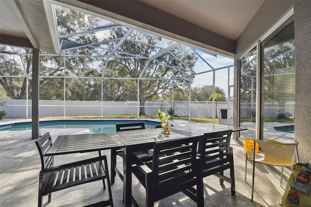 view of patio / terrace featuring a fenced in pool and a lanai