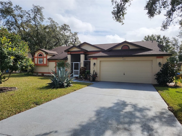 ranch-style home with a garage and a front yard