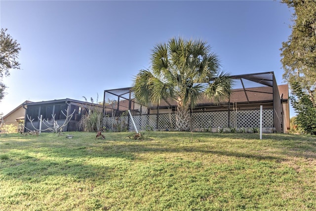 view of yard featuring a lanai