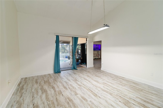 spare room featuring light hardwood / wood-style flooring