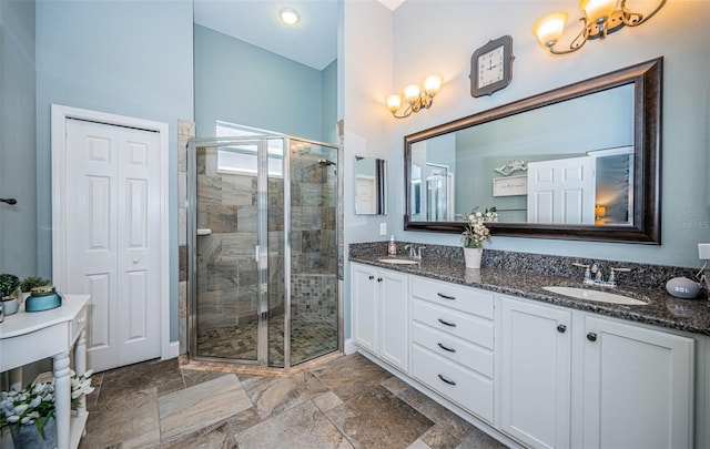 bathroom with vanity and walk in shower