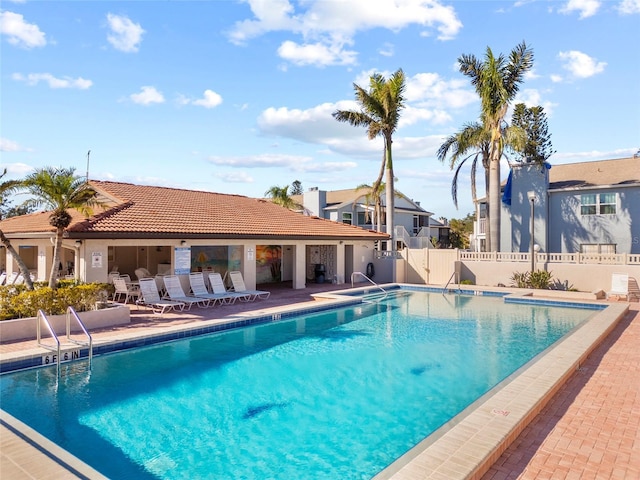 view of pool featuring a patio