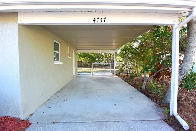 view of patio / terrace featuring a carport