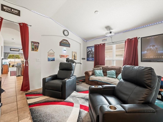 living room with tile patterned flooring and lofted ceiling