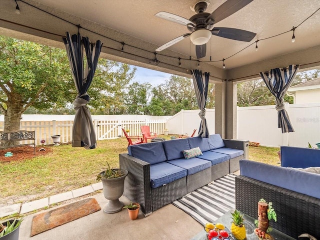 view of patio / terrace featuring ceiling fan and outdoor lounge area