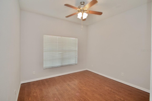 unfurnished room with hardwood / wood-style flooring and ceiling fan