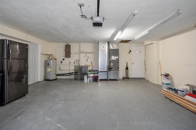 garage with a garage door opener, black refrigerator, electric panel, heating unit, and water heater