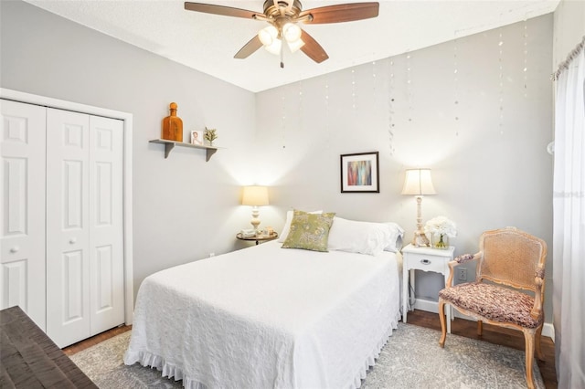 bedroom with a closet and ceiling fan