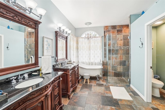 full bathroom with toilet, vanity, a chandelier, and separate shower and tub