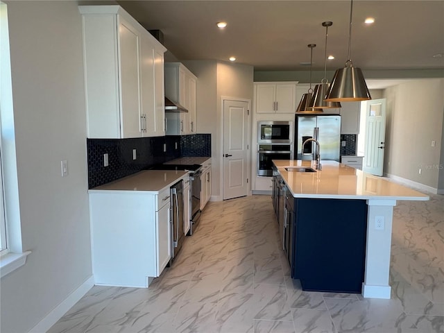 kitchen featuring stainless steel appliances, recessed lighting, marble finish floor, and white cabinetry