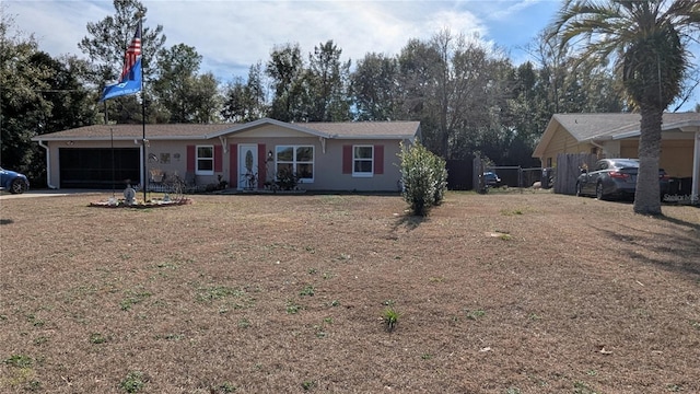 single story home featuring a garage