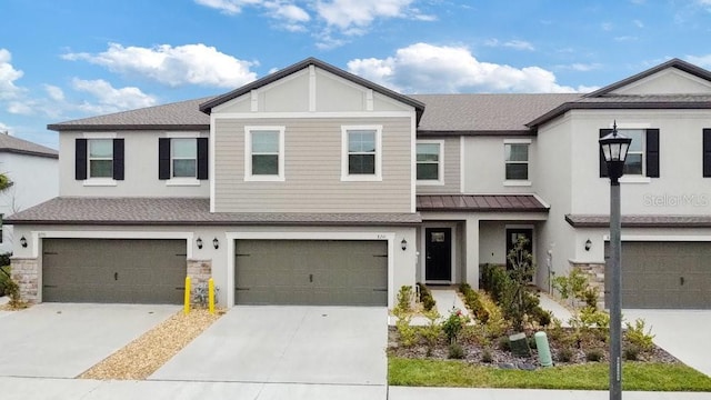 view of front of property featuring a garage