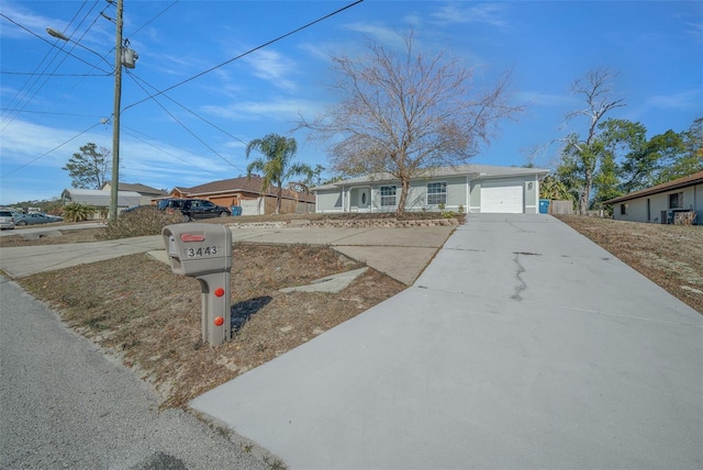 single story home with a garage