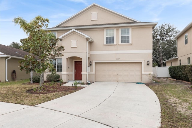 front of property with a garage