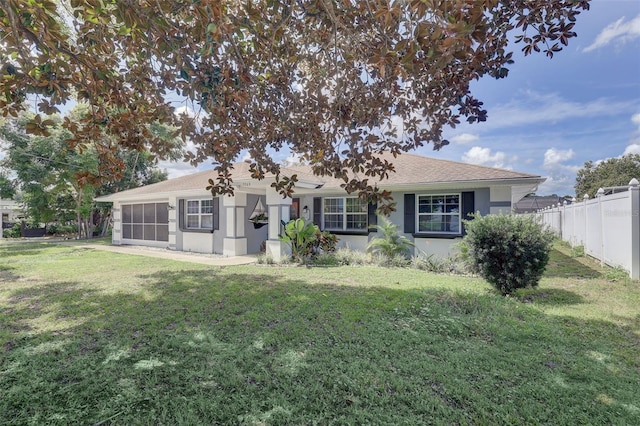 rear view of property with a lawn