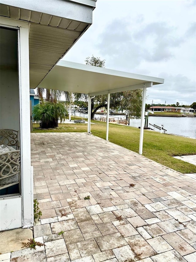 view of patio / terrace with a water view