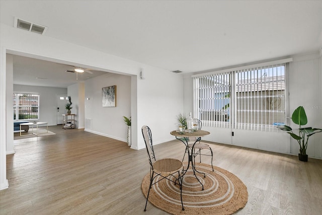 sitting room featuring ceiling fan and light wood-type flooring