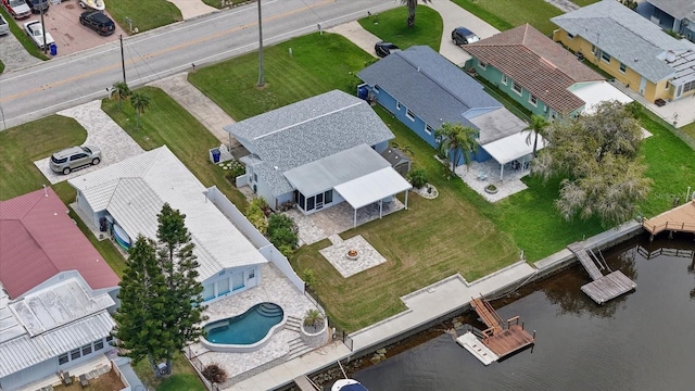 bird's eye view with a water view