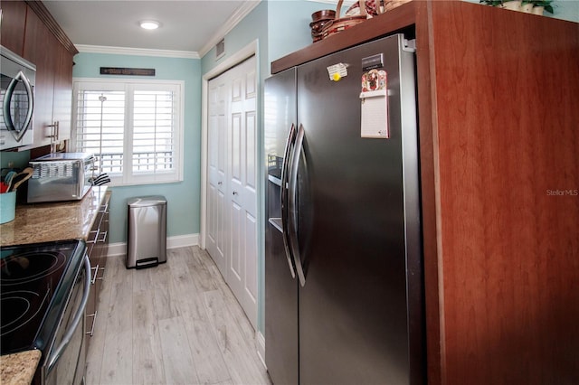 kitchen with crown molding, stainless steel appliances, light stone countertops, and light hardwood / wood-style floors