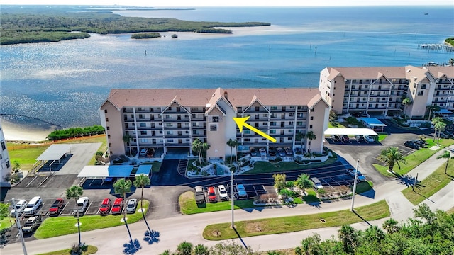 birds eye view of property featuring a water view