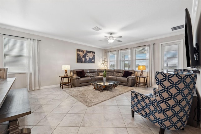 tiled living room with crown molding and ceiling fan