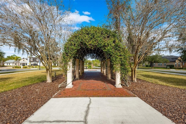 view of home's community featuring a yard