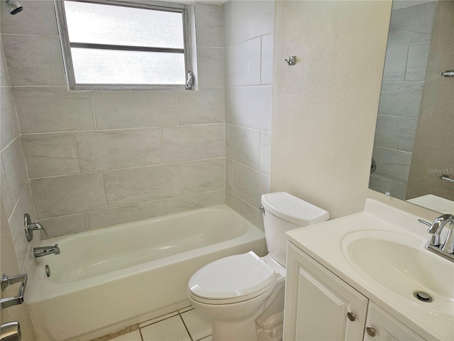 full bathroom with vanity, toilet, tile patterned floors, and tiled shower / bath