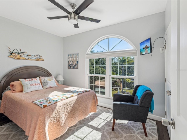 bedroom featuring hardwood / wood-style floors and ceiling fan