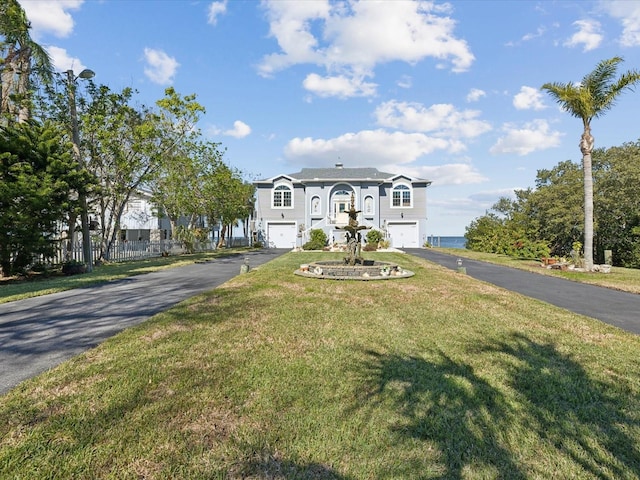 view of front of house with a front lawn