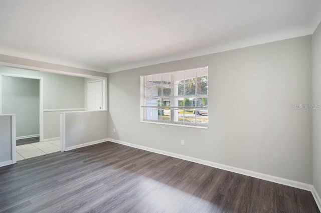 spare room featuring hardwood / wood-style flooring