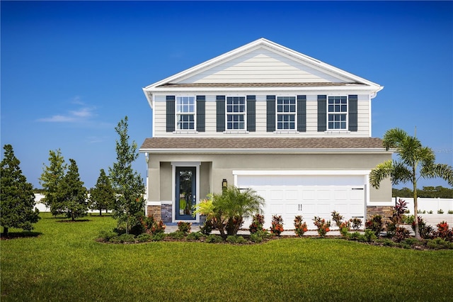 view of front of property featuring a garage and a front lawn