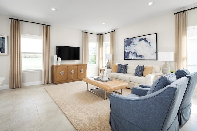 living room with light tile patterned floors