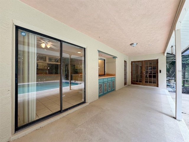 view of patio / terrace featuring french doors