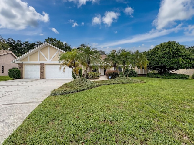 view of front of property featuring a garage and a front yard