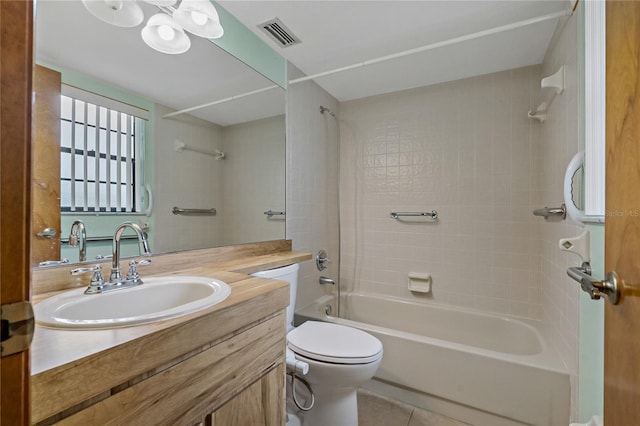 bathroom featuring vanity, visible vents, shower / tub combination, toilet, and tile patterned floors