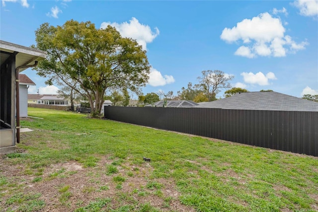 view of yard featuring fence