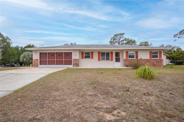 ranch-style house with a garage and a front yard