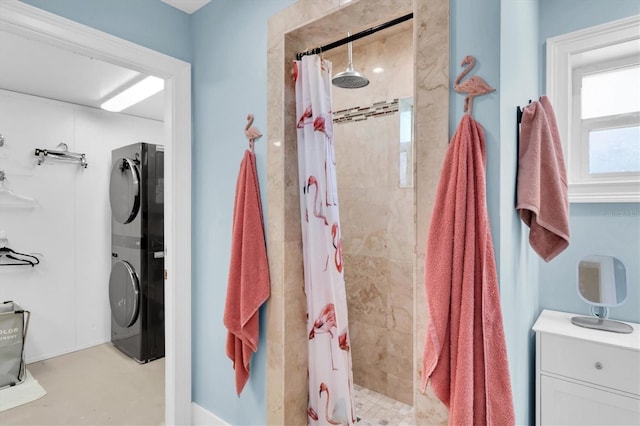 14124 Kulig Ct, Hudson, FL 34667 - full bathroom with stacked washer and clothes dryer and a shower stall