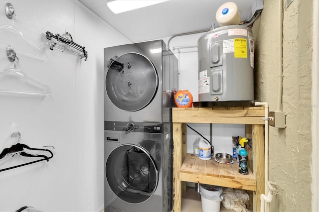 14124 Kulig Ct, Hudson, FL 34667 - clothes washing area with laundry area, stacked washing maching and dryer, and electric water heater