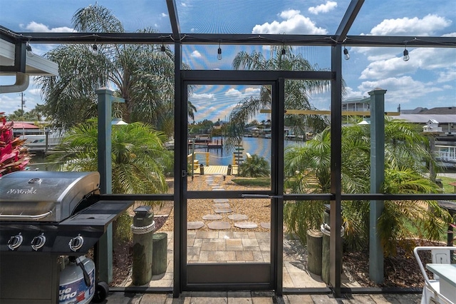 14124 Kulig Ct, Hudson, FL 34667 - sunroom / solarium featuring a water view