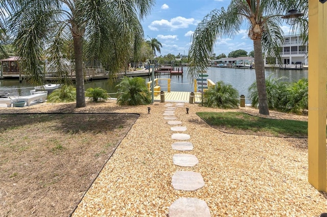 14124 Kulig Ct, Hudson, FL 34667 - view of yard with a dock and a water view