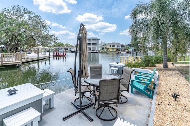 14124 Kulig Ct, Hudson, FL 34667 - view of dock featuring outdoor dining area and a water view
