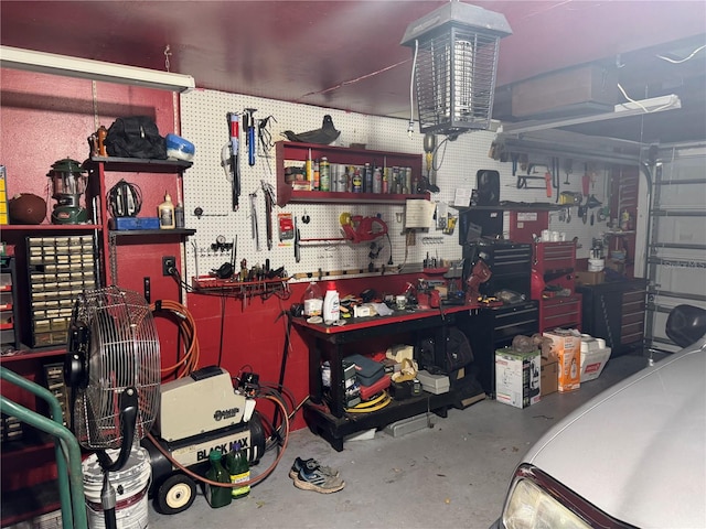 garage with a workshop area