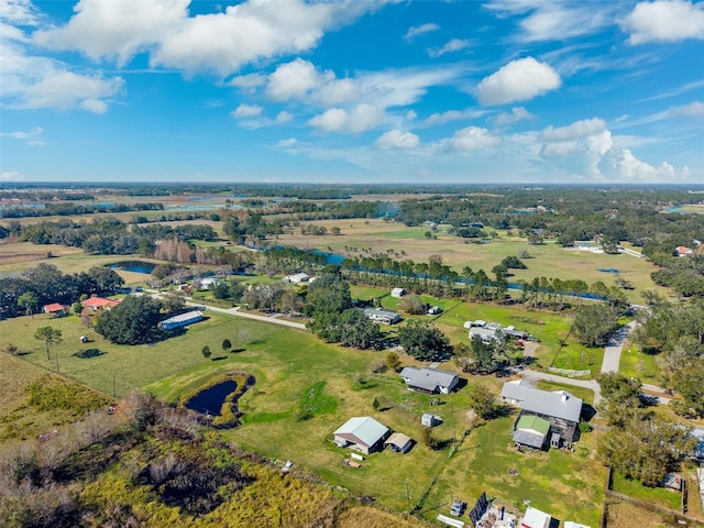 bird's eye view featuring a rural view and a water view