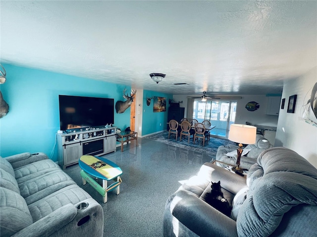 living room featuring a textured ceiling